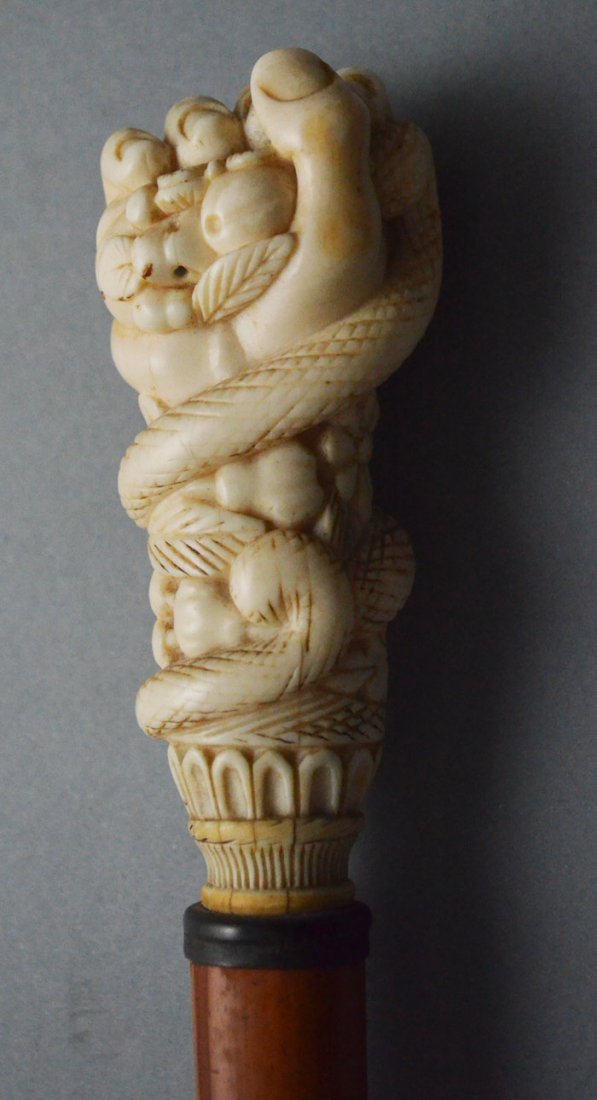 Antique Carved Fist Cane with a Snake & Fruit Motif (1 of 4)