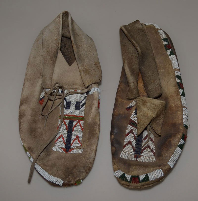 Antique Native American Beaded Leather Moccasins: Measure 11" long x 5" wide. In estate found condition. They have wear, stains and missing beads.