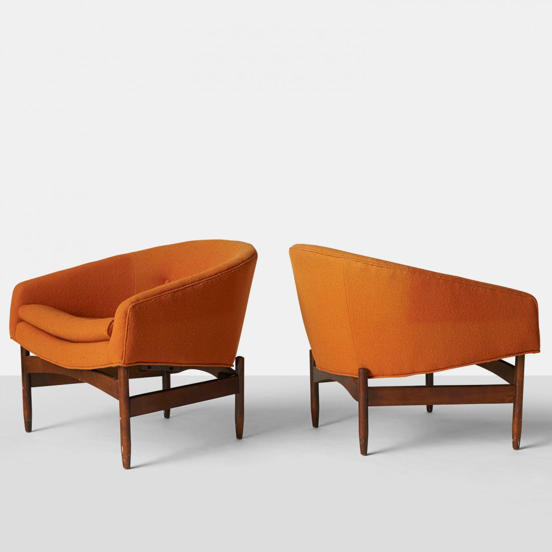 Lawrence Peabody, Pair of Lounge Chairs for Selig: A pair of club chairs with walnut frame and original boucle upholstery with curved backs and three buttons.United States, c1950sWidth : 31.25" Depth : 30.75" Height : 27.5"Walnut, Uphol