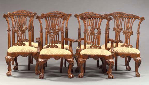 Ashley Furniture Industries Mahogany Chairs: Ashley Furniture Industries Stained Mahogany Dining Chairs, consisting of two armchairs and six sidechairs,^ in the manner of Thomas Chippendale, with a pierced splat, raised on acanthine cabriole leg