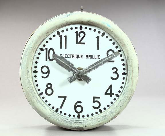 Tin, Copper and Tin Wall Clock: Large and Rare Circular Electrique Brillie Enameled Tin, Copper and Tin Wall Clock, the enameled tin dial with cut-tin hands, a white enamel ground and bas-relief chapters in black, with the "Electriq