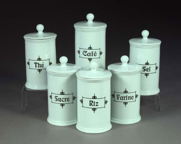 Dutch Cylindrical White Ironstone Kitchen Canister: Set of Six Dutch Cylindrical White Ironstone Kitchen Canisters, labeled in black in the late 19th century style: Sucre, Cafe, Riz, Sel, The and Farine, h. 9", dia. 4-3/4".