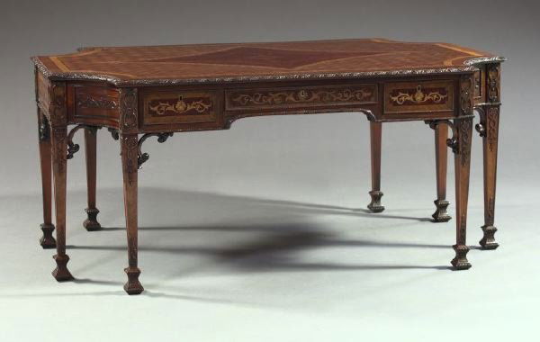 English Mahogany and Mixed Woods Partner's desk: English Parquetry Inlaid Mahogany and Mixed Woods Partner's Desk, in the manner of Thomas Chippendale, the oblong top with deep incurvate corners and featuring a rosewood and mahogany banding centerin