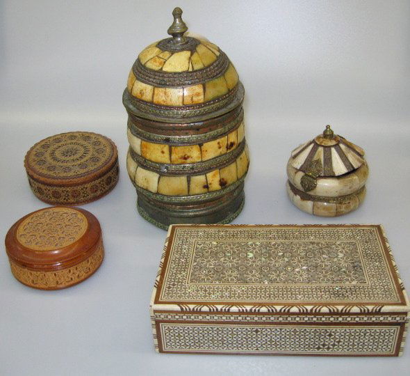 Group of Five Decorative Boxes,: Group of Five Decorative Boxes, consisting of an elaborate North African bone- and mother-of-pearl-inlaid hardwood oblong table box; a large Indian provincial pieced bone, brass and white metal covere