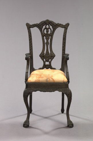 Unusual Edwardian Cast-Iron Doll's Chair,: Unusual Edwardian Cast-Iron Doll's Chair, first quarter 20th century, in the style of Thomas Chippendale, the slip seat upholstered in padded figured taupe damask, the whole supported on tall cabriole