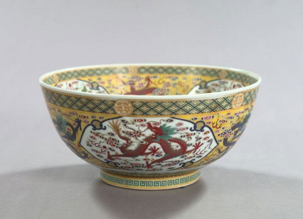 Tung-Chih Polychromed Porcelain Punchbowl: Large Tung-Chih Elaborately Polychromed Porcelain Punchbowl, third quarter 20th century, in "Celestial Dragons" decor, the base with a reign mark in rouge de fer, h. 6-1/2", dia. 13-3/4".