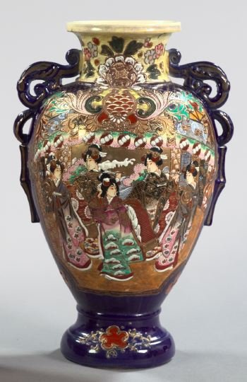 Satsuma Pottery Garniture Vase: Richly Polychromed and Parcel-Gilded Satsuma Pottery Garniture Vase, first quarter 20th century, in "Geishas" decor, the primary ground of cobalt blue, the "brocade" facade with "Geishas" decor, the r