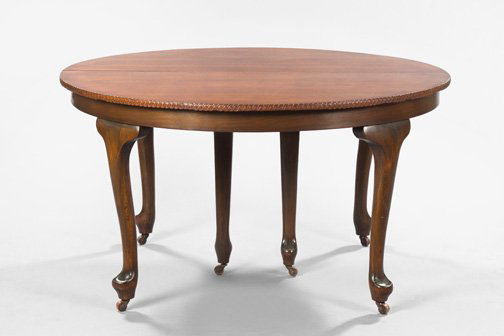 George III-Style Mahogany Dining Table,: George III-Style Mahogany Dining Table, early 20th century, in the Queen Anne taste, the circular top opening to accommodate leaves (none present), raised on cabriole legs with pad feet on casters, h.