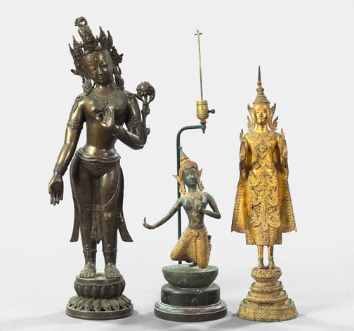 Group of Three Oriental Bronze Figures,: Group of Three Oriental Bronze Figures, consisting of a tall Nepalese patinated bronze figure of a bare-breasted goddess standing atop a lotus, third quarter 19th century, h. 33", a parcel-gilt and pa
