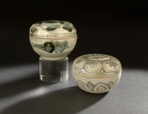 Chinese Porcelain Covered Cosmetic Jars: Two Chinese Blue and White Porcelain Covered Cosmetic Jars, Ming Dynasty (1368-1644), one decorated with flowers in reserve panels, and the other decorated with fruit and foliage, dia. 3".