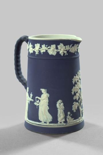 Wedgwood Slate Blue Jasperware Milk Pitcher,: Wedgwood Slate Blue Jasperware Milk Pitcher, fourth quarter 19th century, of tapered cylindrical form in "Classical Figures with Offerings" decor, h. 6-1/2", dia. 4-3/4".
