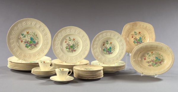 Wedgwood Embossed Queen's Ware Service: Forty-Piece Wedgwood Embossed Queen's Ware Partial Service for Ten Persons, in "Wellesley" decor, second quarter 20th century, comprised of eight dinner plates, dia. 11", ten salad plates, dia. 7", se