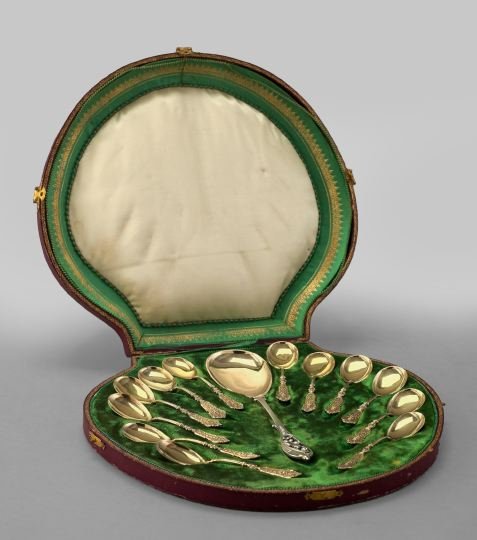 .800-Standard Silver and Silver-Gilt Dessert Servi: Good Thirteen-Piece German Cased .800-Standard Silver and Silver-Gilt Dessert Service for Twelve Persons, fourth quarter 19th century, in the Mannerist taste, the service composed of a silver "Lily-of