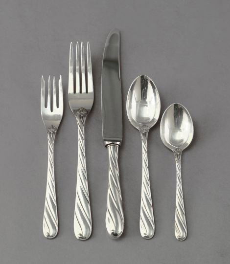 Thirty-Nine-Piece Buccellati Sterling Silver Flatw: Cased Thirty-Nine-Piece Buccellati Silverplate "Spiral" Partial Flatware Service, for eight persons, comprised of eight hollow-handled dinner knives, l. 9-1/2", eight dinner forks, eight place spoons,
