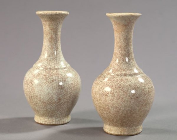 Tao Kuang Ecru Porcelain Long-Neck Vases: Pair of Tao Kuang Ecru Crackle-Glazed Porcelain Long-Neck Vases, second quarter 19th century, in the Sung Dynasty style, h. 9-1/4".