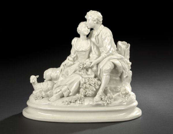 Large Capodimonte Blanc-de-Chine Porcelain Group: Large Capodimonte Blanc-de-Chine Porcelain Group of an 18th-Century Courting Couple, first quarter 20th century, modeled by J. d'Aste, the couple attended by a pair of lambs, signed at the rear proper