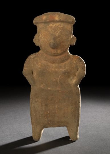 Nayarit Terra Cotta Standing Female Figure,: Nayarit Terra Cotta Standing Female Figure, ca. 100 B.C.-A.D. 250, depicted with the arms at the sides, wearing a hat, ear decorations, nose plug, armlets, skirt and necklace, the front of the figure 
