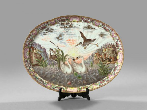Large Meissen Porcelain Tray,: Large Meissen Porcelain Tray, fourth quarter 19th century, of oval form with elaborate bas-relief decoration of a pair of swans swimming on a cliff-edged river while a stork hovers above, the base wit