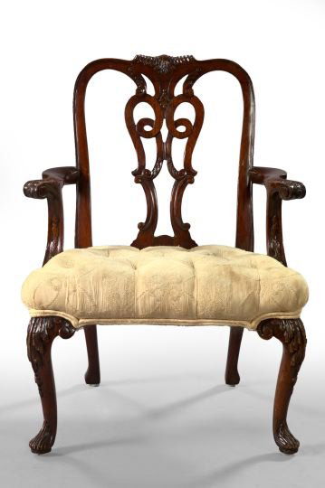 George V Carved Mahogany Miniature Armchair: George V Carved Mahogany Miniature Open Armchair, second quarter 20th century, in the style of Thomas Chippendale, fitted with a tufted and buttoned upholstered seat in deep ivory damask, h. 24-1/2".