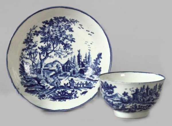 Caughley Porcelain Tea Bowl an Saucer: Caughley Blue and White Porcelain Tea Bowl and Saucer, fourth quarter 18th century, in "Chinoiserie Landscape" decor, each piece marked with the Caughley crescent in underglaze blue on the base, h. 1-