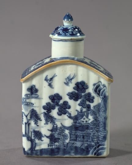 Chinese Export Porcelain Tea Caddy: Chinese Export Blue and White Porcelain Tea Caddy, fourth quarter 18th century, the ribbed, flat-sided caddy of "house" form, in "Lakeside Pavilions" decor, retaining the diminutive period cover of "c