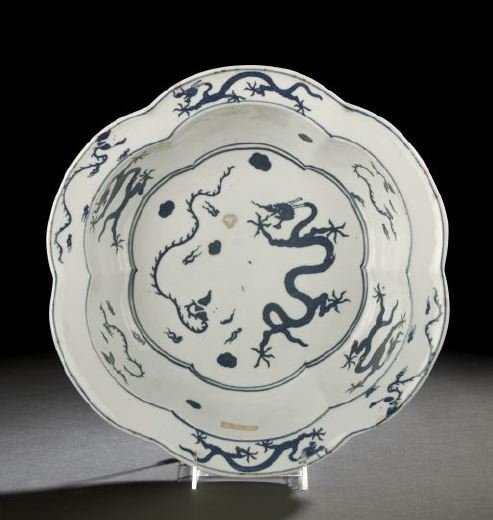 Chinese Export Blue and White Porcelain Basin: Chinese Export Blue and White Porcelain Basin, Daoguang Reign (1821-1850), of lobed hexagonal outline, decorated in underglaze blue with a central dragon among clouds and frolicking dragons on the wel