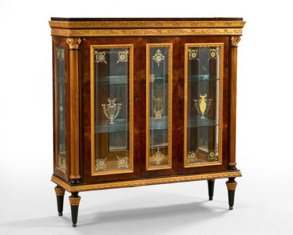 Louis XVI-Style Ebonized and Burlwood Vitrine: Louis XVI-Style Glazed, Ebonized and Burlwood Vitrine, the molded and foliate-decorated cornice over a case with a pair of glazed doors flanking a glazed panel, each with silvered stenciling in the ne