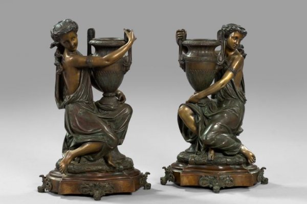 Napoleon III Patinated Bronze Garniture Vases: Large Pair of Napoleon III Patinated Bronze Garniture Vases, modeled as kneeling neoclassical maidens balancing large Antique vases on their knees, signed on the reverses of the plinths "A. Carrier", 