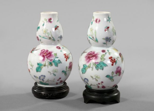 Pair of Tao Kuang Porcelain Garniture Vases: Attractive Pair of Tao Kuang Porcelain Garniture Vases, second quarter 19th century, of double-gourd form in "Flowers and Insects" decor, each example signed on the base in rouge-de-fer calligraphy an