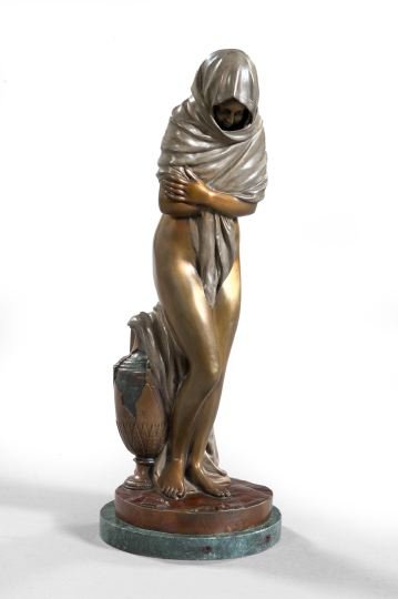 Jean-Antoine Houdon (French, 1741-1828): Jean-Antoine Houdon (French, 1741-1828) "Winter", a triple-patinated bronze figure of a shivering scantily draped female figure, presented on a disc base of polished verde antico marble, signed at the