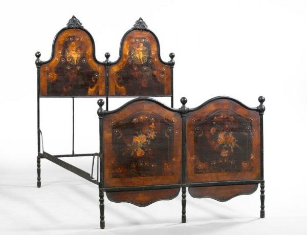 Good French Tole-Painted Bedstead,: Good French Tole-Painted Bedstead, third quarter 19th century, the headboard featuring two arched metal panels decorated with winged putti, the footboard of similar form with floral-painted decor, h.