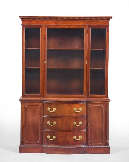 George III-Style Mahogany China Cabinet,: George III-Style Mahogany China Cabinet, 20th century, the molded and dentillated cornice above a case fitted with a central glazed door, the lower section fitted with three central bowed drawers, fla