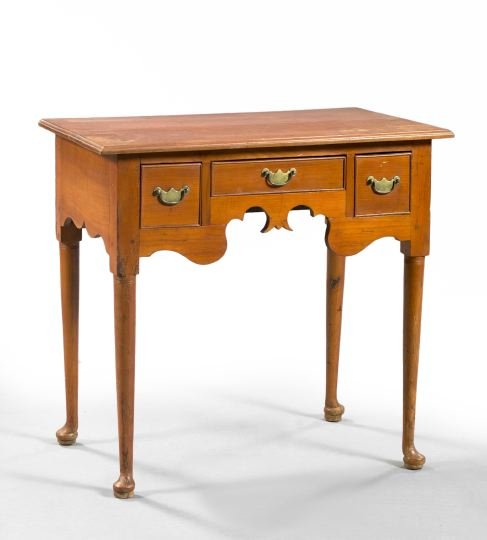 American Queen Anne Cherrywood Lowboy Table: Good American Queen Anne Cherrywood Lowboy Dressing Table, mid-18th century, the rectangular molded and overhanging top above three drawers and a shaped valence, raised on slender legs ending in pad f