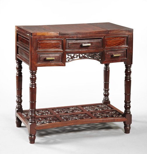 Chinese Rosewood Dressing Table,: Chinese Rosewood Dressing Table, late 19th century, the shaped rectangular top trisected, the center opening to an adjustable oval mirror, the sides opening to storage spaces, one opening to two small