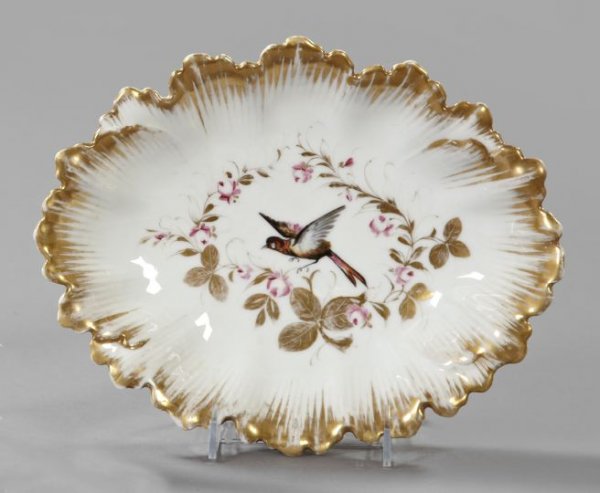 Attractive Paris Porcelain Bowl,: Attractive Paris Porcelain Bowl, third quarter 19th century, of oval form in floral/avian decor in the rococo taste, w. 9-1/8", l. 11-1/2".