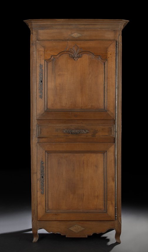 Louis XV Provincial Mahogany Bonnetiere,: Louis XV Provincial Mahogany Bonnetiere, 18th century and later, the molded cornice with canted corners above a conforming case fitted with a diamond-inlaid frieze over two cupboard doors divided by a