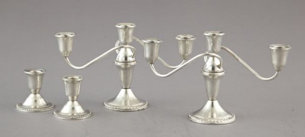Four-Piece Group of Sterling Silver Candle Holder