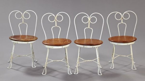 Set of Four American Iron and Oak Children's Chai: Set of Four American Iron and Oak Children's Chairs, in the "Ice Cream Parlor" style, the frames painted in matte white, the circular oak seats in a natural finish, h. 21".