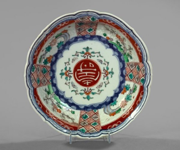 Japanese Meiji Arita Polychromed Porcelain Bowl: Japanese Meiji Arita Polychromed Porcelain Bowl, fourth quarter 19th century, of lobed circular form, the palette in cobalt blue, rouge de fer, green, teal and white, dia. 12-1/4".