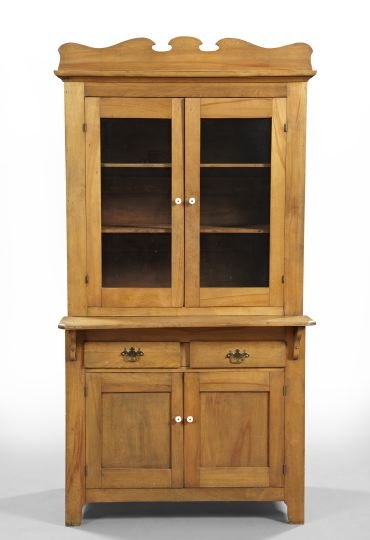 American Walnut Kitchen Cupboard,: American Walnut Kitchen Cupboard, early 20th century, the shaped cornice above two glazed doors, the lower section fitted with two short drawers over two paneled cupboard doors, raised on block feet, 