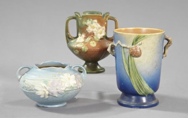 Three-Piece Group of Roseville Pottery,: Three-Piece Group of Roseville Pottery, second quarter 20th century, comprised of a "Pinecone" two-handled vase of footed beaker form; a "Cosmos" two-handled vase of cushion form; and a "White Rose" t