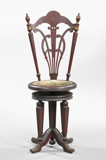 Victorian Brass-Mounted Mahogany Music Chair: Late Victorian Brass-Mounted Mahogany Music Chair, fourth quarter 19th century, the tall back with carved splat, the rotating and extending circular seat retaining its patterned plush upholstery, on t