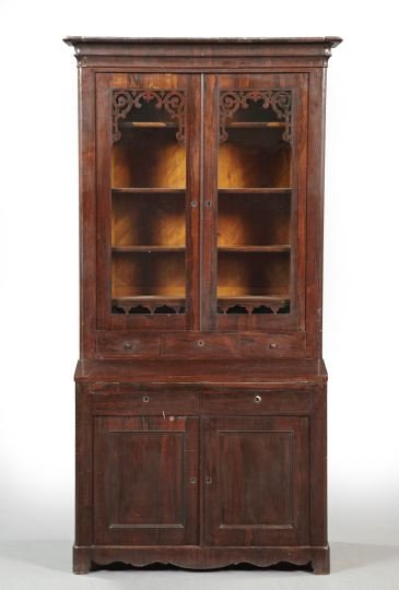 Rococo Revival Rosewood Secretary Bookcase: American Transitional Late Classical into Rococo Revival Rosewood Secretary Bookcase, mid-19th century, the upper section with a projecting stepped cove-molded cornice, over a pair of glazed doors, ea