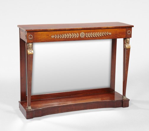 Regency Mahogany Side Table,: Regency Mahogany Side Table, first quarter 19th century, the highly figured rectangular top above a conforming frieze fitted with a single ormolu-mounted drawer joined by a mirrored back and tapering 
