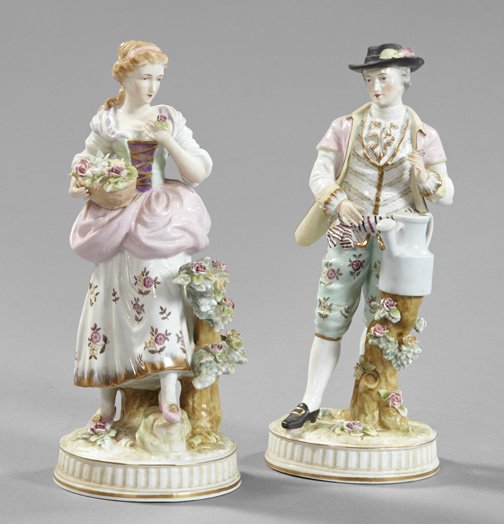 Attractive Pair of French Porcelain Bocage Figures: Attractive Pair of French Porcelain Bocage Figures, fourth quarter 19th century, perhaps by Edme Samson, Paris, depicting a Louis XVI dandy and his lady, both dressed as peasants, he with a watering c