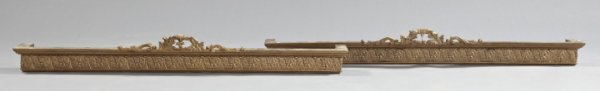 American Giltwood and Plaster Drapery Valences: Pair of American Carved Giltwood and Plaster Drapery Valences, fourth quarter 19th century, in the neoclassical taste, each with a cresting of "en face" giltwood leaf-sprays centering a flowerhead, th