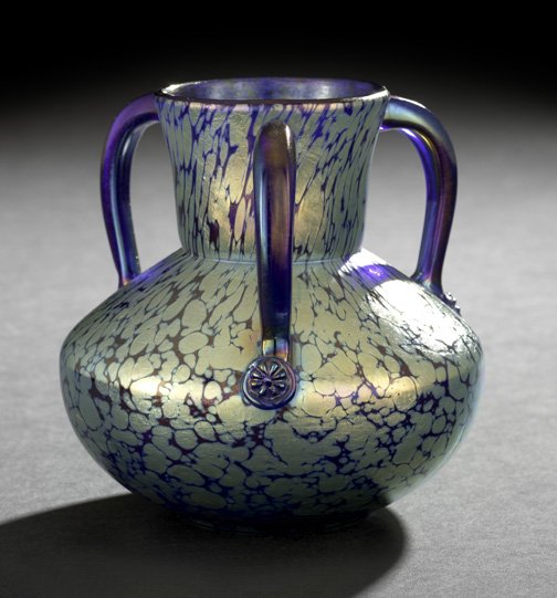 Johann Loetz-Witwe, Klostermuhle, Vase: Johann Loetz-Witwe, Klostermuhle, Triple-Handled Vase, first quarter 20th century, composed of iridized oil spot cobalt blue glass, the lower terminus of each cobalt blue handle with a circular flower