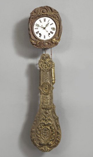 French Embossed Tole and Brass Morbier Wall Clock: French Embossed Tole and Brass Morbier Wall Clock, third quarter 19th century, of large size, retains the long embossed gilt-brass pendulum in the neoclassical taste and the period weights, the circul