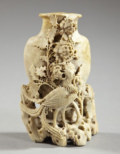 Kuang Hsu Buff Soapstone Vase,: Kuang Hsu Buff Soapstone Vase, fourth quarter 19th century, featuring a crested bird and a flowering peony bush on a rocky crag, h. 8-3/4", w. 5-3/4", d. 4".