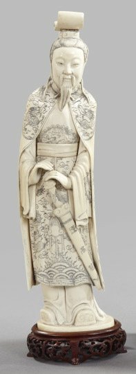 Chinese Ivory Figure: Chinese Ivory Figure of "The First Han Dynasty Emperor", elaborately carved, engraved and having black enamel detailing, the emperor depicted in court robes and headdress and bearing a sword, the figu